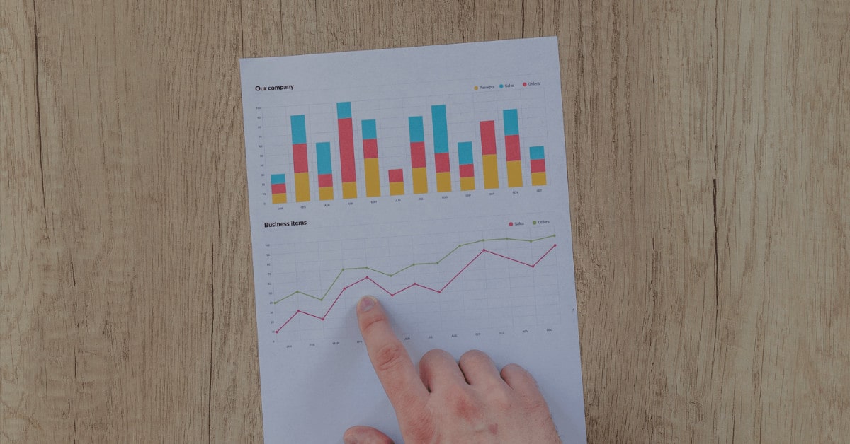 Pointing to reporting charts - Rebrand ROI how rebranding can boost your bottom line